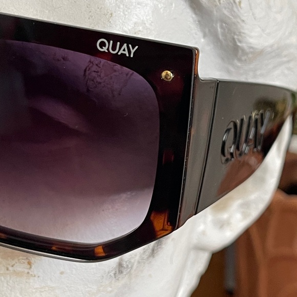 QUAY large frame sunglasses with thick sides.